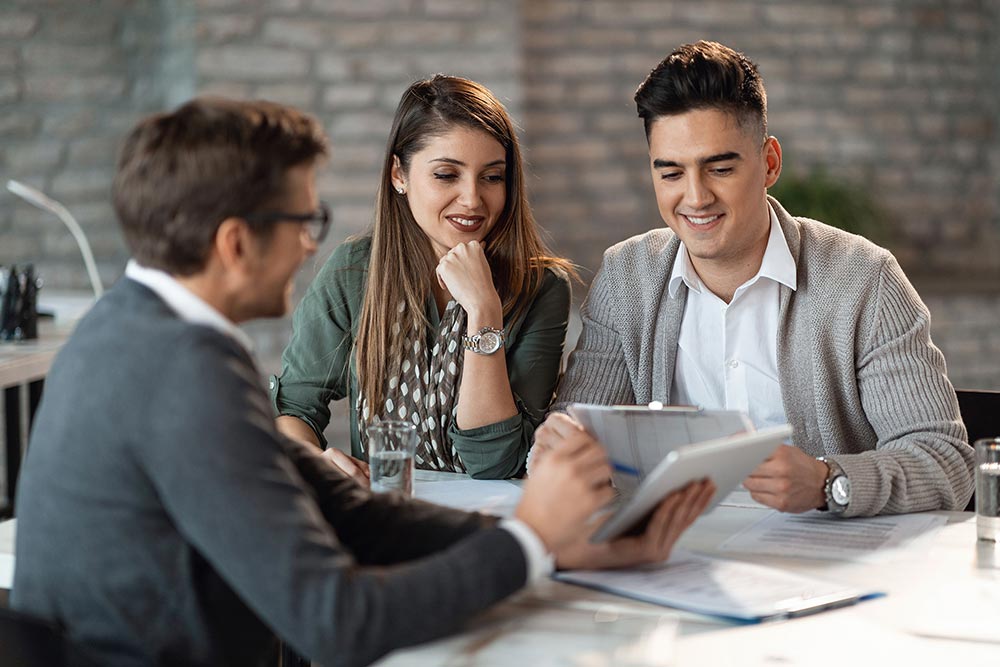 Global buyers reviewing property documents